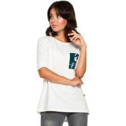 Bluzka ze wstawkami w kwiaty - ecru. Bluzki damskie BE, s, z nadrukiem, z elastanu, eleganckie, bez kołnierzyka, bez rękawów. W wyprzedaży za 129,00 zł.