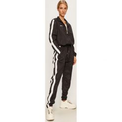 Ellesse - Kombinezon. Czarne kombinezony damskie Ellesse, na co dzień, bez wzorów, z poliesteru, casualowe, bez kołnierzyka, z długim rękawem, długie. W wyprzedaży za 339,90 zł.