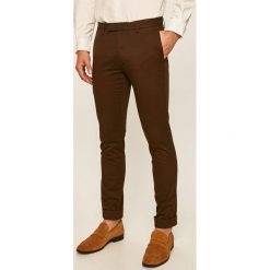 Polo Ralph Lauren - Spodnie. Pomarańczowe spodnie męskie Polo Ralph Lauren, bez wzorów, z elastanu. Za 639,90 zł.