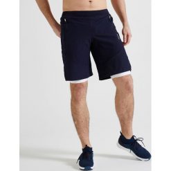 Spodenki 2 w 1 fitness cardio FST 500 męskie. Białe spodenki sportowe męskie DOMYOS, xl, bez wzorów, z elastanu, sportowe, na fitness i siłownię. Za 69,99 zł.
