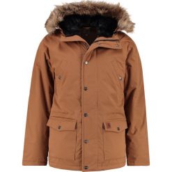 Carhartt WIP TRAPPER Kurtka zimowa hamilton brown/black. Pomarańczowe kurtki męskie marki Carhartt WIP, na zimę, xl, bez wzorów, z bawełny, bez kaptura. Za 1049,00 zł.