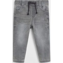 Mango Kids - Jeansy dziecięce Domfy 80-104 cm. Szare spodnie chłopięce Mango Kids, bez wzorów, z elastanu. Za 69,90 zł.