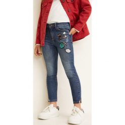 Mango Kids - Jeansy dziecięce Patch 110-164 cm. Niebieskie rurki dziewczęce marki Mango Kids, z aplikacjami, z bawełny. Za 99,90 zł.