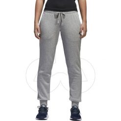 Spodnie damskie adidas ESSENTIALS S97160. Szare spodnie damskie Adidas, s, z bawełny, na fitness i siłownię. Za 129,90 zł.