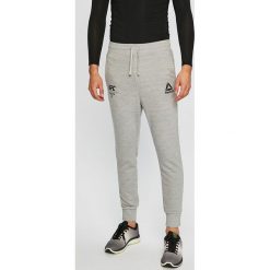 Reebok - Spodnie. Szare spodnie męskie Reebok, xl, z bawełny, sportowe. W wyprzedaży za 179,90 zł.