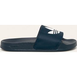 Adidas Originals - Klapki Adilette. Niebieskie klapki damskie adidas Originals, bez wzorów, z gumy, bez obcasa, na obcasie. Za 129,90 zł.
