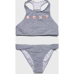 Roxy - Strój kąpielowy dziecięcy 128-176 cm. Białe stroje kąpielowe dziewczęce Roxy, bez wzorów, z elastanu. Za 169,90 zł.