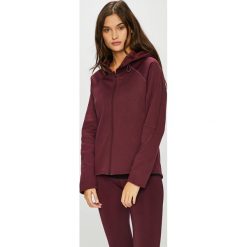 Puma - Bluza. Fioletowe bluzy damskie z kieszeniami marki Puma, s, z poliesteru, z kapturem. W wyprzedaży za 229,90 zł.
