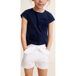 Mango Kids - Szorty dziecięce Second 110-164 cm. Białe spodenki dziewczęce Mango Kids, bez wzorów, z bawełny, casualowe. W wyprzedaży za 29,90 zł.