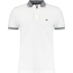 Lacoste Koszulka polo blanc/marine. Białe koszulki polo Lacoste, m, z bawełny. Za 409,00 zł.