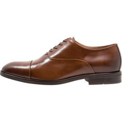 KIOMI Eleganckie buty cognac. Brązowe buty wizytowe męskie marki KIOMI, ze skóry, na sznurówki. Za 419,00 zł.