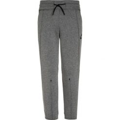 Nike Performance Spodnie treningowe carbon heather/black/heather. Szare spodnie chłopięce Nike Performance, z bawełny. W wyprzedaży za 168,35 zł.