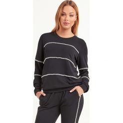 BLUZA LIU JO SPORT. Czarne bluzy sportowe damskie Liu Jo Sport, s, bez wzorów, z elastanu, bez rękawów, bez kaptura. Za 549,00 zł.