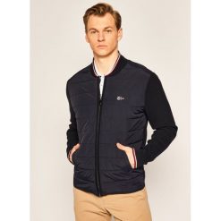 Kurtka bomber TOMMY HILFIGER MERCEDES-BENZ 2Mb Mixed Media TT0TT07085. Niebieskie kurtki męskie TOMMY HILFIGER, m, bez wzorów, z bawełny, bez kaptura. Za 899,00 zł.
