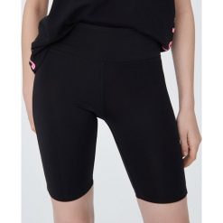 Krótkie leginsy sportowe - Czarny. Czarne legginsy sportowe damskie Sinsay, xl, bez wzorów. Za 29,99 zł.