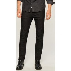 Jeansy slim fit - Czarny. Niebieskie jeansy męskie relaxed fit marki Giacomo Conti, z wełny. Za 89,99 zł.