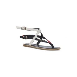 Sandały Tommy Hilfiger 020 STRAPPY SANDAL. Białe sandały damskie TOMMY HILFIGER, bez wzorów, bez obcasa, bez zapięcia. Za 330,51 zł.