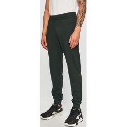EA7 Emporio Armani - Spodnie. Zielone spodnie męskie EA7 Emporio Armani, m, bez wzorów, z bawełny. W wyprzedaży za 239,90 zł.