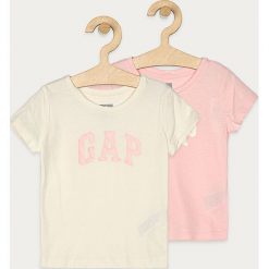 GAP - T-shirt dziecięcy 74-104 cm. Różowe bluzki dziewczęce GAP, z aplikacjami, z dzianiny, z okrągłym kołnierzem, z krótkim rękawem, krótkie, bez kaptura. Za 99,90 zł.