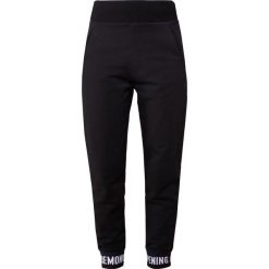 Opening Ceremony LOGO PANT Spodnie treningowe black. Czarne spodnie sportowe damskie marki Opening Ceremony, z bawełny. W wyprzedaży za 394,50 zł.