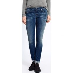 Diesel - Jeansy Skinzee-Low. Niebieskie jeansy damskie slim marki Diesel, s, z aplikacjami, z elastanu, z obniżonym stanem. W wyprzedaży za 239,90 zł.