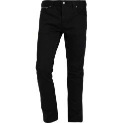 Nudie Jeans GRIM TIM Jeansy Slim Fit dry black. Czarne jeansy męskie marki Nudie Jeans, m, bez wzorów. Za 839,00 zł.