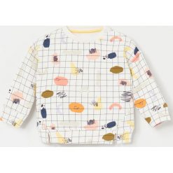 Bluza dresowa ze wzorem - Kremowy. Białe bluzy damskie Reserved, bez wzorów, z dresówki, bez rękawów, bez kaptura. Za 55,99 zł.
