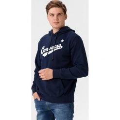 Converse Script Pullover Bluza Niebieski. Niebieskie bluzy męskie Converse, m, z nadrukiem, z bawełny, bez kołnierzyka, bez rękawów, bez kaptura. Za 223,95 zł.