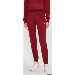 Nike Sportswear - Spodnie. Szare spodnie damskie Nike Sportswear, s, bez wzorów, z bawełny, casualowe. Za 159,90 zł.