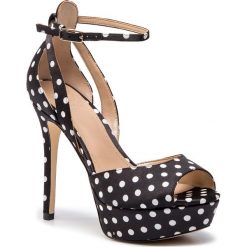 Sandały GUESS - Laurele2 FL6LU2 FAP03 BLACK. Czarne klapki damskie Guess, z aplikacjami, ze skóry ekologicznej, bez obcasa, na obcasie. W wyprzedaży za 589,00 zł.