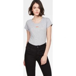 G-Star Raw - Top. Niebieskie topy damskie marki G-Star RAW, s, z nadrukiem, z bawełny, z okrągłym kołnierzem. W wyprzedaży za 79,90 zł.