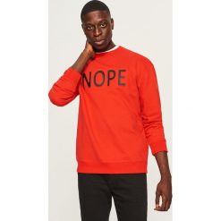 Bluza z aplikacją Nope - Czerwony. Czerwone bluzy męskie rozpinane marki Reserved, s, z aplikacjami. W wyprzedaży za 39,99 zł.