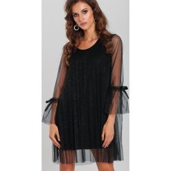 Czarna Sukienka Zonit. Czarne sukienki damskie Renee, s, z aplikacjami, z tiulu, wizytowe, bez kołnierzyka, bez rękawów, długie, trapezowe. Za 129,99 zł.