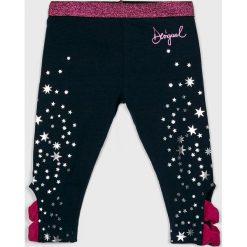Desigual - Legginsy dziecięce 98-164 cm. Niebieskie spodnie dziewczęce Desigual, bez wzorów, z elastanu. W wyprzedaży za 89,90 zł.