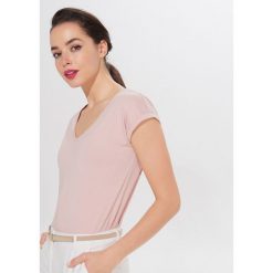 Koszulka z bawełną organiczną Eco Aware - Różowy. Różowe koszulki damskie Mohito, xl, bez wzorów, z bawełny, bez kołnierzyka, bez rękawów. Za 39,99 zł.
