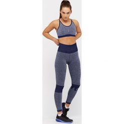 Spodnie damskie: Asics Legginsy damskie Seamless Tight niebieskie r. S (146408-8052)