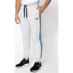 Spodnie dresowe Emporio Armani Underwear 111690 0P571 00048. Szare jeansy męskie Emporio Armani Underwear, xl, bez wzorów. Za 399,00 zł.