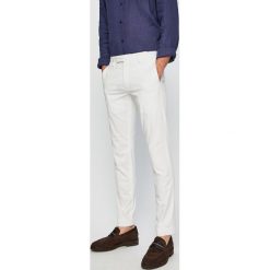 Polo Ralph Lauren - Spodnie. Białe spodnie męskie Polo Ralph Lauren, na co dzień, bez wzorów, z elastanu. W wyprzedaży za 449,90 zł.