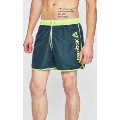 Reebok - Szorty. Niebieskie spodenki sportowe męskie Reebok, m, z nadrukiem, z poliesteru, sportowe. W wyprzedaży za 99,90 zł.