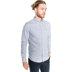 Tommy Hilfiger Koszula Niebieski. Niebieskie koszule męskie TOMMY HILFIGER, s, bez wzorów, z bawełny, bez kołnierzyka, z długim rękawem. Za 430,95 zł.
