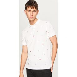 Koszulka polo w drobny wzór - Biały. Białe koszulki polo Reserved, l. W wyprzedaży za 29,99 zł.