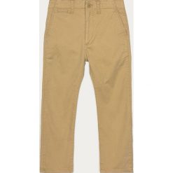 GAP - Spodnie dziecięce 110-176 cm. Niebieskie spodnie chłopięce GAP, bez wzorów, z elastanu, z podwyższonym stanem. Za 139,90 zł.