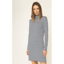 Sukienka dzianinowa Tommy Jeans Rib DW0DW07199. Białe sukienki damskie Tommy Jeans, l, bez wzorów, z elastanu, bez kołnierzyka, bez rękawów. W wyprzedaży za 209,00 zł.