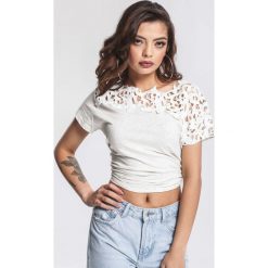 Szara Bluzka Astonishment. Szare bluzki damskie marki other, xl, bez wzorów, z dzianiny, bez kołnierzyka, z krótkim rękawem. Za 39,99 zł.