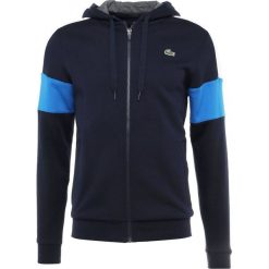 Lacoste Sport Bluza rozpinana navy blue/white/blue royal/pitch. Niebieskie bejsbolówki męskie Lacoste Sport, m, z bawełny. Za 459,00 zł.