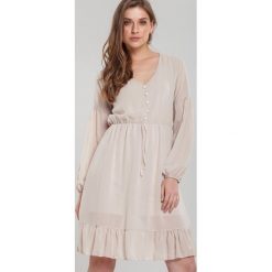 Jasnobeżowa Sukienka Blaze. Brązowe sukienki dziewczęce Renee, z aplikacjami, eleganckie, bez rękawów, długie, mini. Za 89,99 zł.
