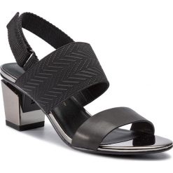 Sandały UNITED NUDE - Lev Sandal Mid 104233927108 Black Mix. Czarne klapki damskie marki United Nude, bez wzorów, ze skóry, bez obcasa, na obcasie. Za 899,00 zł.