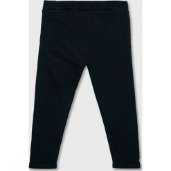 Blukids - Spodnie dziecięce 74-98 cm. Niebieskie spodnie dziewczęce Blukids, bez wzorów, z bawełny, casualowe. Za 59,90 zł.