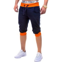 KRÓTKIE SPODENKI MĘSKIE DRESOWE P29 - GRANATOWO-POMARAŃCZOWE. Pomarańczowe spodenki dresowe męskie marki Ombre Clothing, sportowe. Za 31,20 zł.