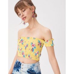 Top w kwiaty - Żółty. Żółte topy damskie Sinsay, s, w kwiaty, bez kołnierzyka. Za 29,99 zł.